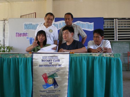 signing of M.JPG